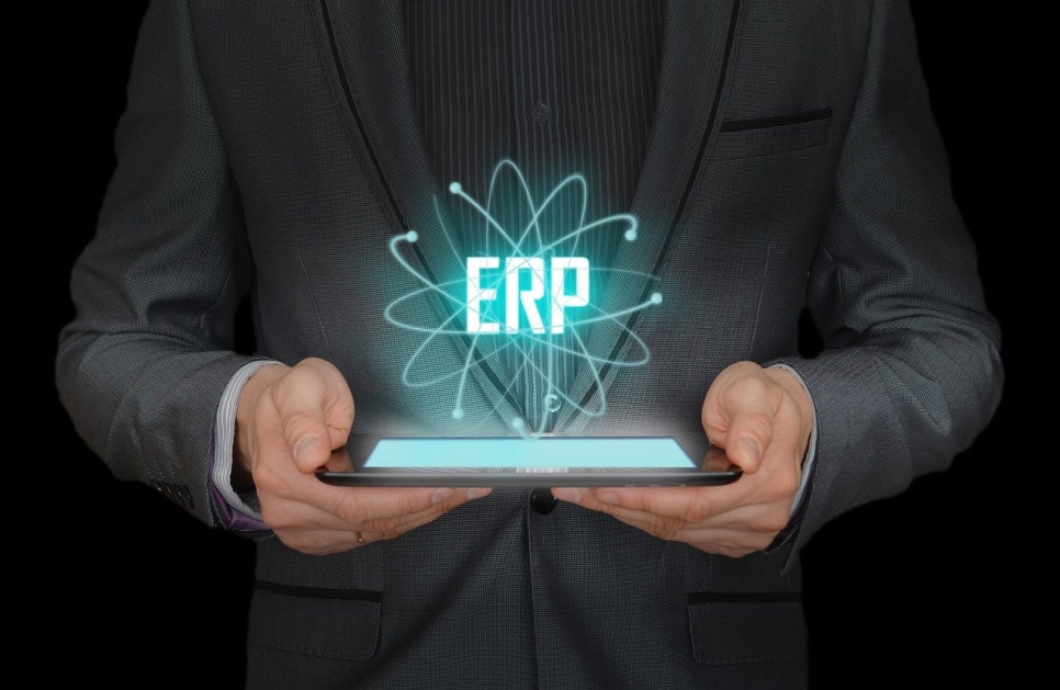 An ERP hologram floating above a tablet