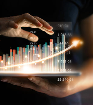 A hand pointing at a rising performance chart